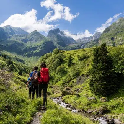 hikers on the trail, Ascending towards Hourgade Peak, L´Ourtiga, Luchon, Pyrenean mountain range, France